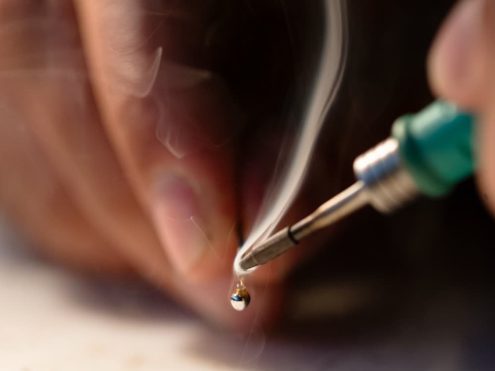 Precision micro-soldering board-level repair work